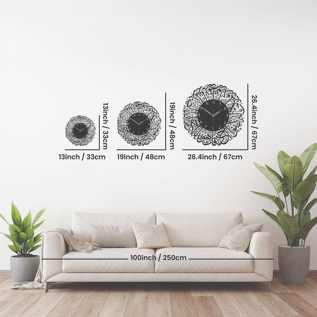 Size comparison of Surah Al-Ikhlas metal clocks: 13 in / 33 cm, 19 in / 48 cm and 26.4 in / 67 cm above a sofa