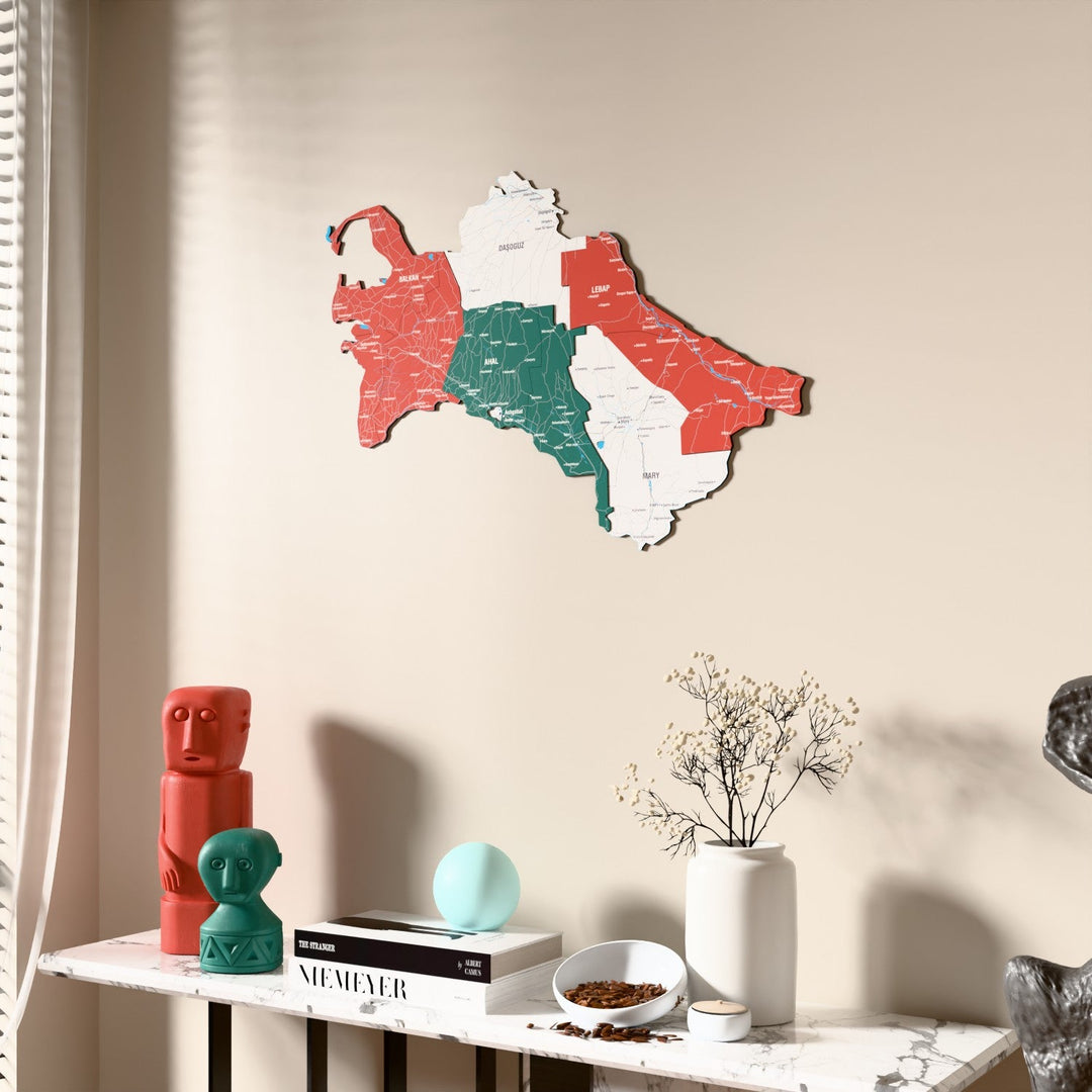 Flag colored Turkmenistan wooden wall map beside a sheer curtain, angled view