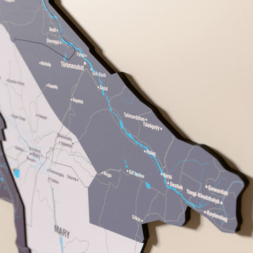 Close-up of the Nimbus Turkmenistan wooden wall map with layered regions and printed names
