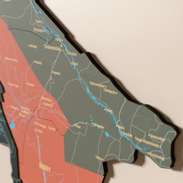 Close-up of the Sage Turkmenistan wooden wall map with layered regions and printed names