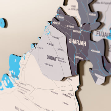 Close-up of the Nimbus United Arab Emirates wooden wall map with layered regions and printed names
