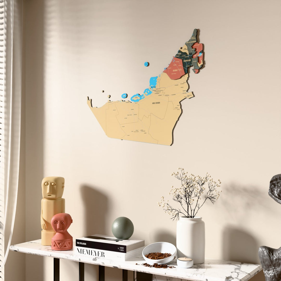 Sage United Arab Emirates wooden wall map beside a sheer curtain, angled view