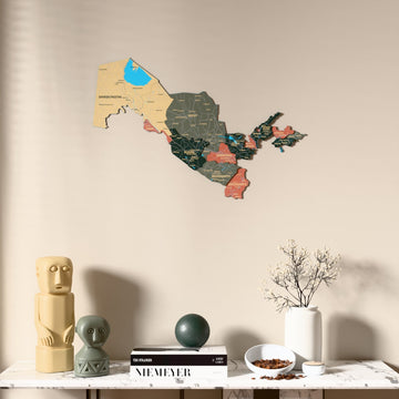 Sage Uzbekistan wooden wall map above a marble console, front view