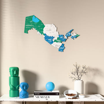 Flag colored Uzbekistan wooden wall map above a marble console, front view