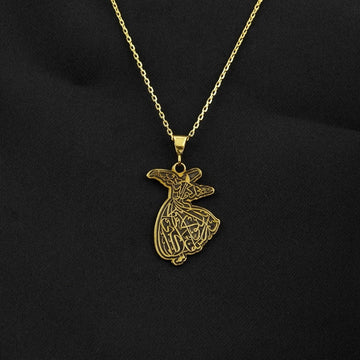 Halskette mit Anhänger „Wirbelnder Derwisch“ in Gold vor schwarzem Hintergrund, Vorderansicht an goldener Kette