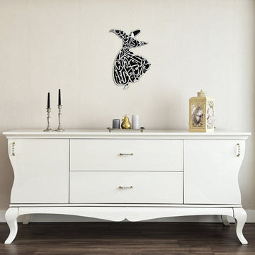 Whirling dervish wooden wall art with a silver acrylic face, wide view above a white sideboard