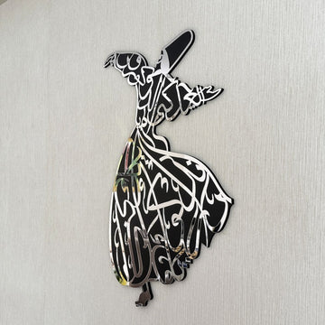 Whirling dervish wooden wall art in silver, large angled view showing the mirror-like face