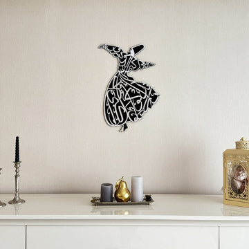 Whirling dervish wooden wall art in silver on a wall, three-quarter view above a sideboard