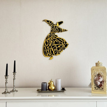 Whirling dervish wooden wall art with a gold acrylic face above a white sideboard with candlesticks