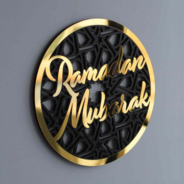 Close-up of the Gold circular Ramadan Mubarak wall decor with a glossy acrylic rim