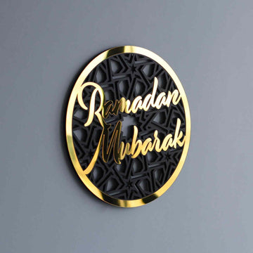 Gold Ramadan Mubarak circular wall decor angled on a gray wall, smaller view