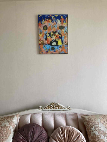 Seven Sleepers tempered glass wall art on a wall above a cushioned sofa